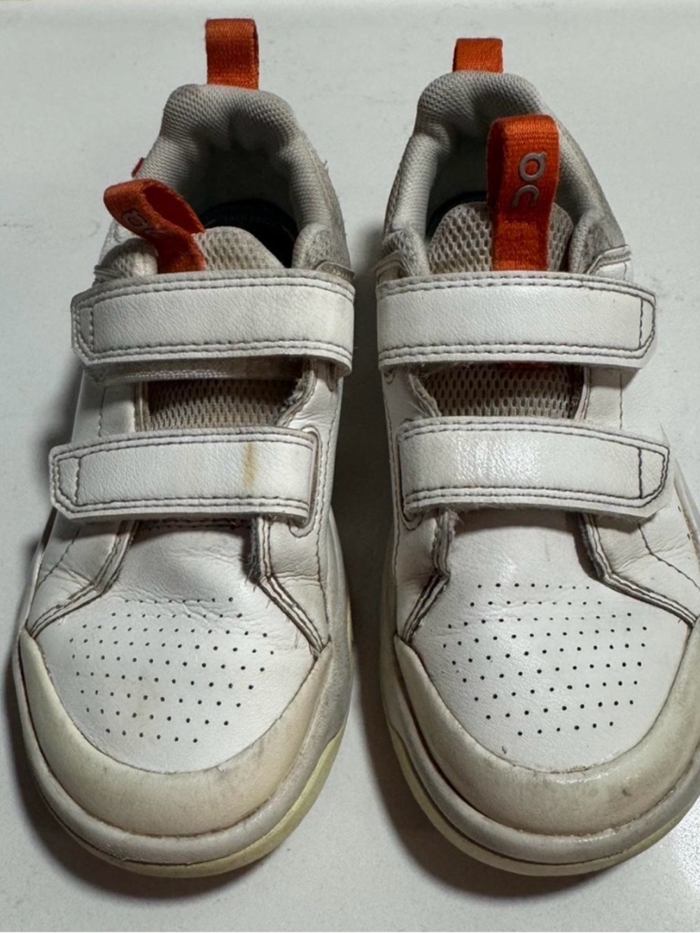 On Running Kids White Leather Sneakers with Orange Pull Tabs